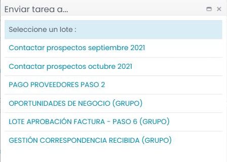 Ventana «Enviar tarea a…» con la lista de lotes; algunos llevan el sufijo «(GRUPO)».